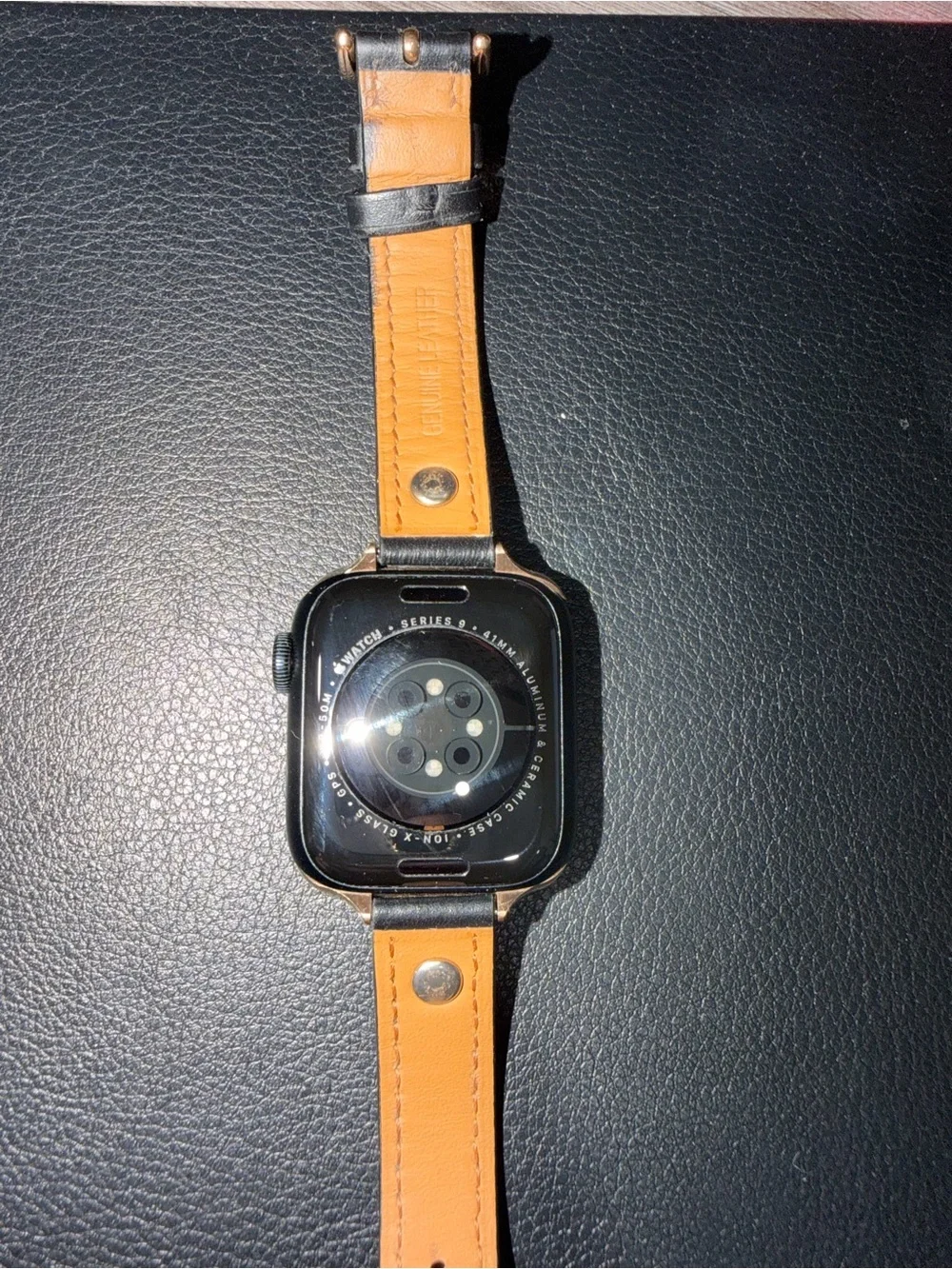 Apple Smartwatch with Black Case and Rose Gold Accents